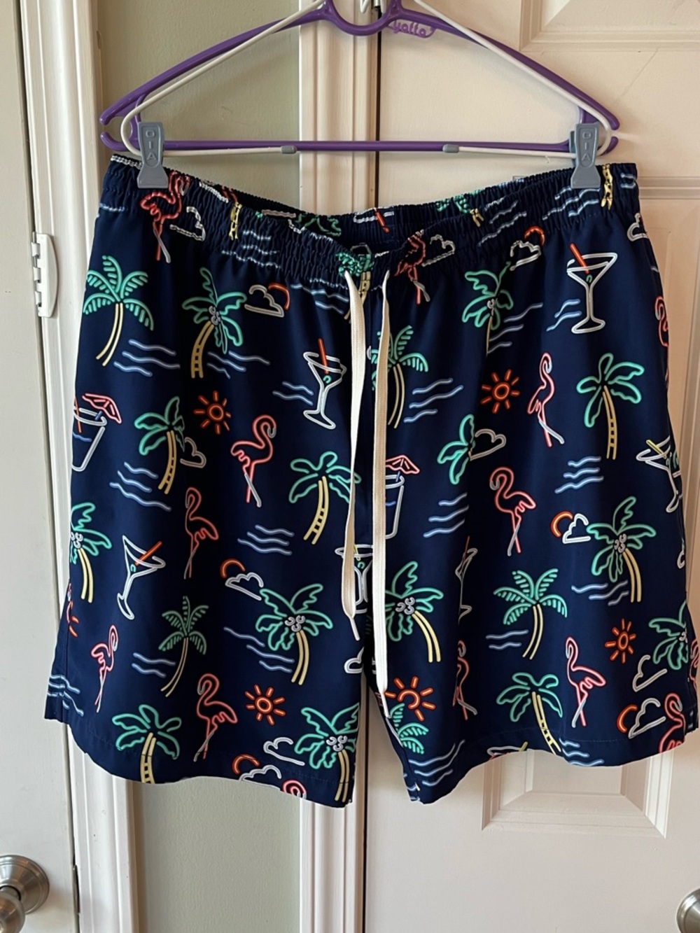 Men’s chubbies Navy Swim Trunks with Neon Palm & Flamingo Print